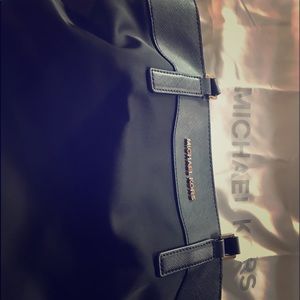 Large Michael Kors purse.